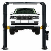 WL-10ASY two-post lift raising an SUV, front view