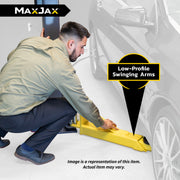 MaxJax M7K low-profile lift arms positioned for under-vehicle access in a home garage.